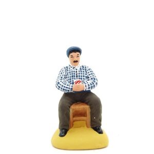 LOU 85 JOUEUR DE CARTE ( mains sur le ventre et casquette )